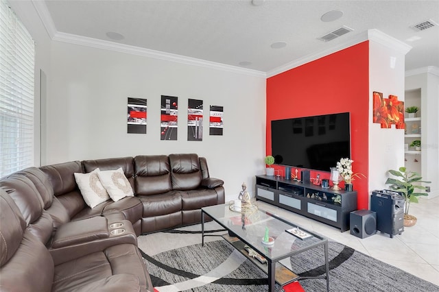 living room with a textured ceiling, crown molding, and light tile patterned floors