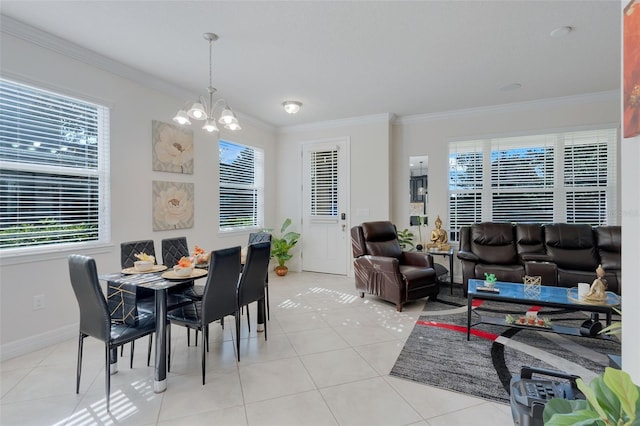 tiled dining space featuring an inviting chandelier, ornamental molding, and a wealth of natural light