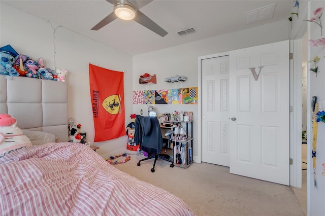 2917 Windmill Dr, Kissimmee, FL 34741 - bedroom featuring ceiling fan, carpet, and visible vents