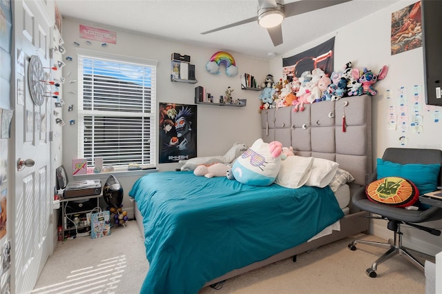 bedroom with ceiling fan and carpet floors