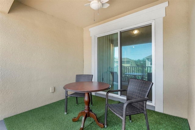 interior space featuring ceiling fan