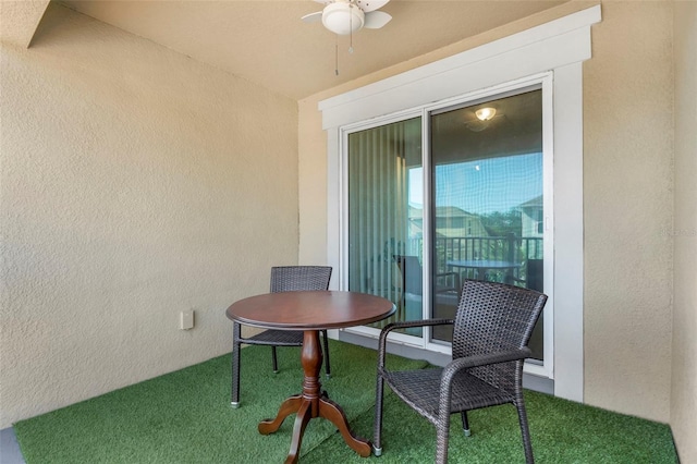 2917 Windmill Dr, Kissimmee, FL 34741 - carpeted dining room with ceiling fan and a textured wall