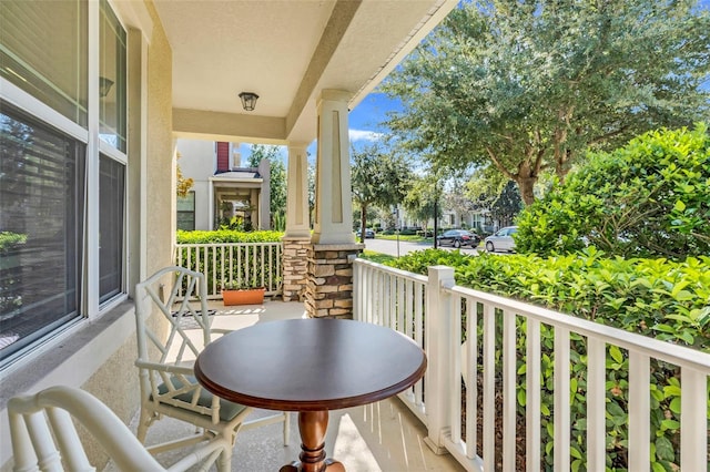 balcony featuring covered porch