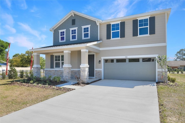 500 Summit River Dr, Apopka, FL 32712 - craftsman-style house featuring covered porch, stone siding, concrete driveway, fence, and an attached garage