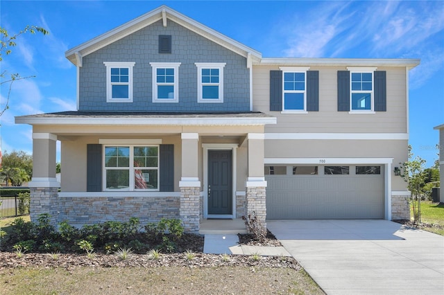 500 Summit River Dr, Apopka, FL 32712 - craftsman-style house with stone siding, a garage, and concrete driveway