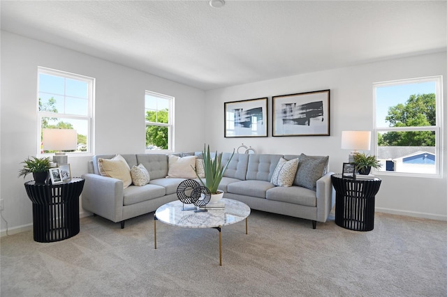500 Summit River Dr, Apopka, FL 32712 - carpeted living area featuring a wealth of natural light, baseboards, and a textured ceiling