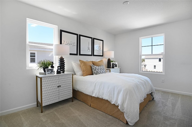 500 Summit River Dr, Apopka, FL 32712 - carpeted bedroom featuring baseboards