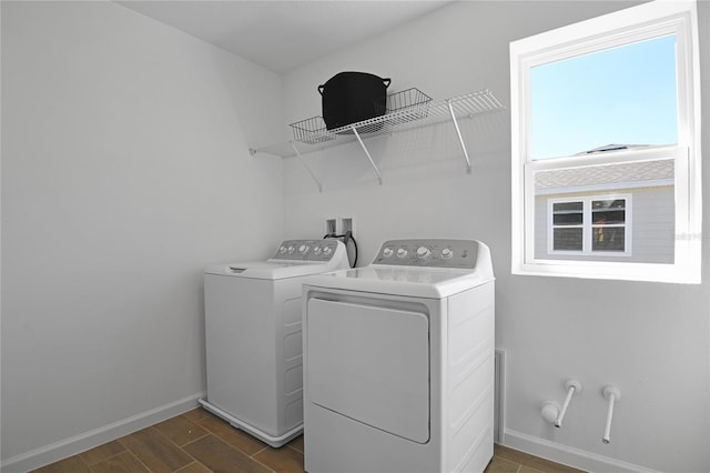 500 Summit River Dr, Apopka, FL 32712 - washroom with separate washer and dryer, dark wood-style floors, baseboards, and laundry area