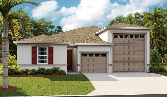 view of front facade featuring a front yard and a garage