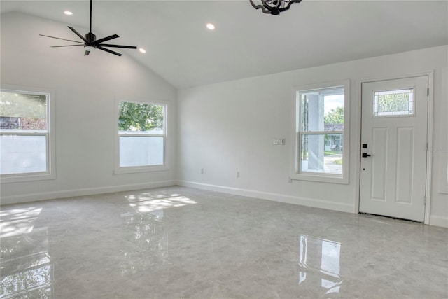 entrance foyer featuring high vaulted ceiling and ceiling fan