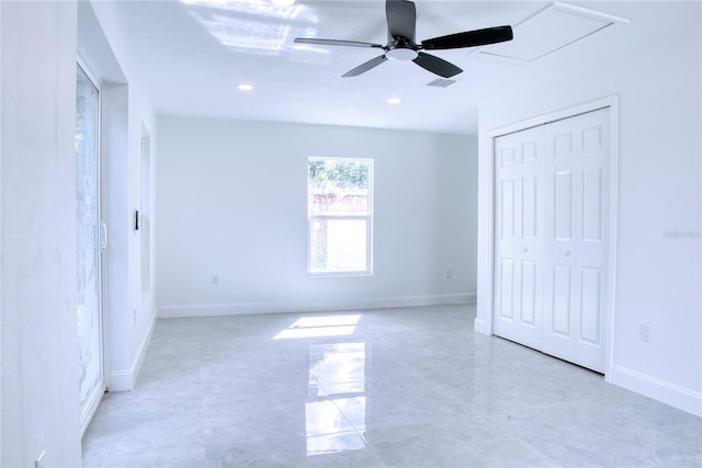 unfurnished room featuring ceiling fan