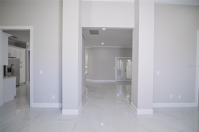 interior space featuring ornamental molding