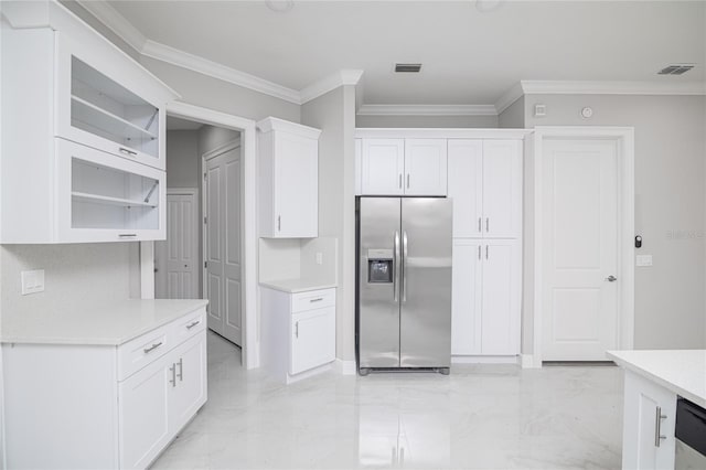 kitchen with stainless steel refrigerator with ice dispenser, white cabinetry, backsplash, ornamental molding, and dishwashing machine