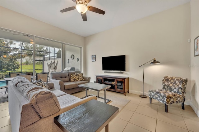 tiled living room featuring ceiling fan