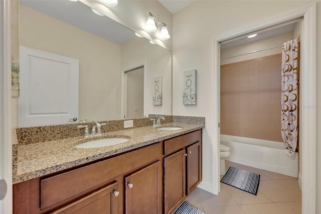 full bathroom with tile patterned flooring, toilet, shower / tub combo with curtain, and vanity