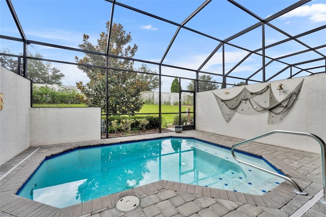 view of swimming pool with a lanai