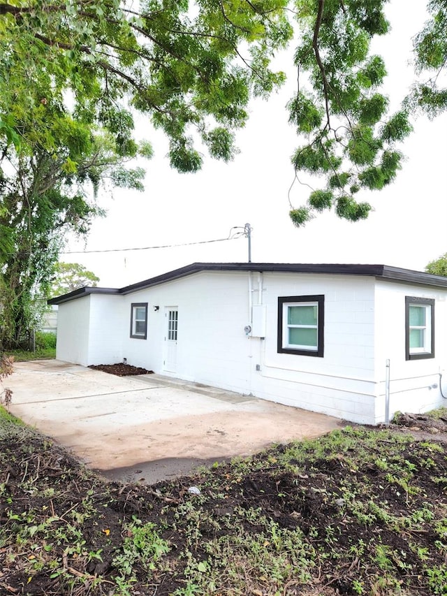 rear view of property with a patio area