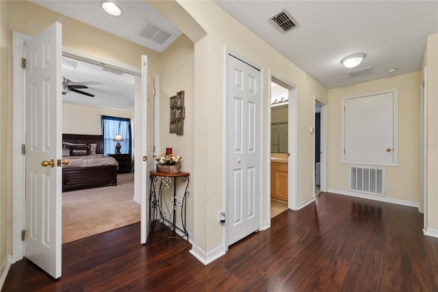 hall featuring dark hardwood / wood-style floors