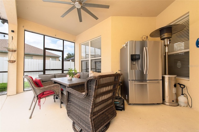 interior space featuring ceiling fan