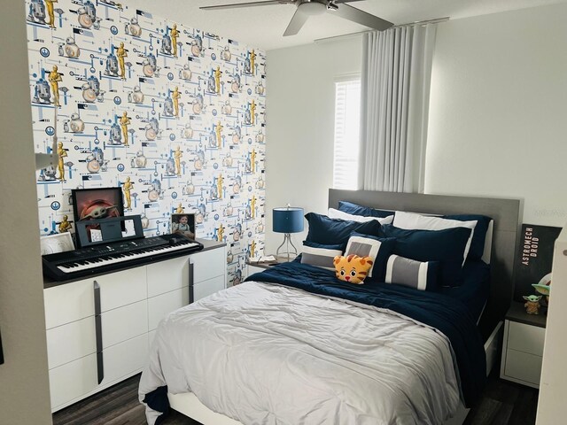 bedroom featuring ceiling fan and dark hardwood / wood-style flooring