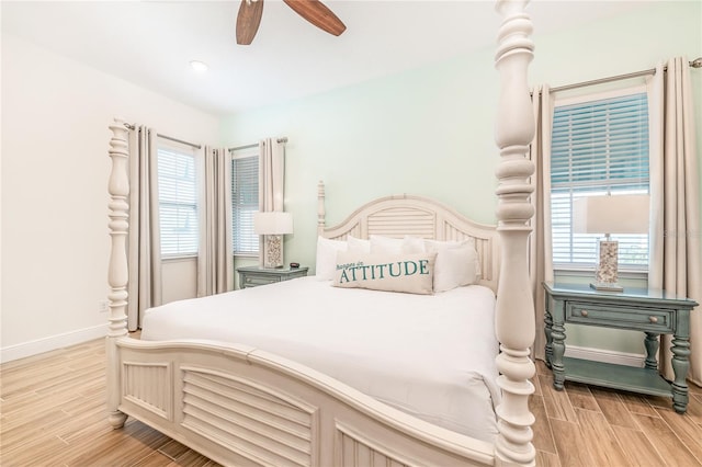 bedroom featuring ceiling fan and light hardwood / wood-style floors