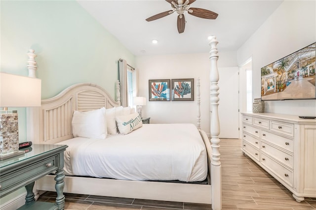 bedroom featuring ceiling fan and light hardwood / wood-style floors