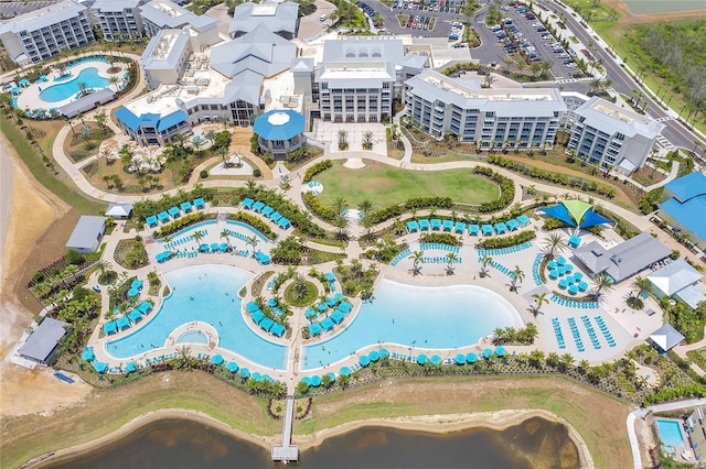 birds eye view of property with a water view