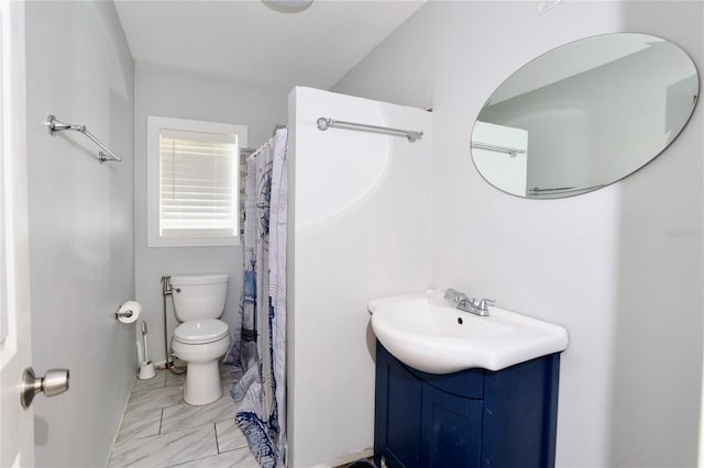 full bath with toilet, marble finish floor, and vanity