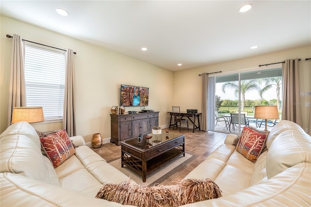 living room with light tile patterned floors