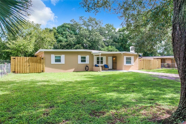 ranch-style house with a front yard