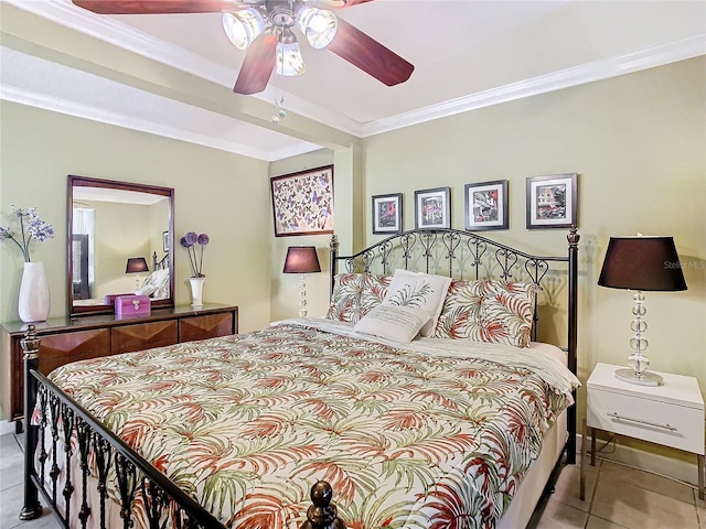 tiled bedroom featuring ornamental molding and ceiling fan