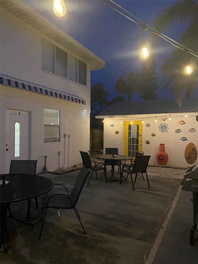 view of patio at twilight