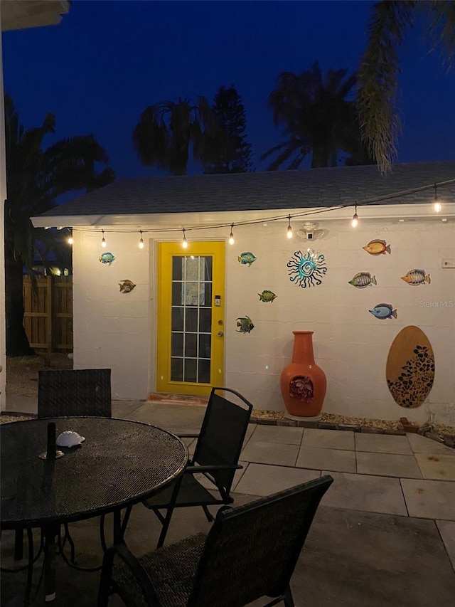 view of patio at twilight