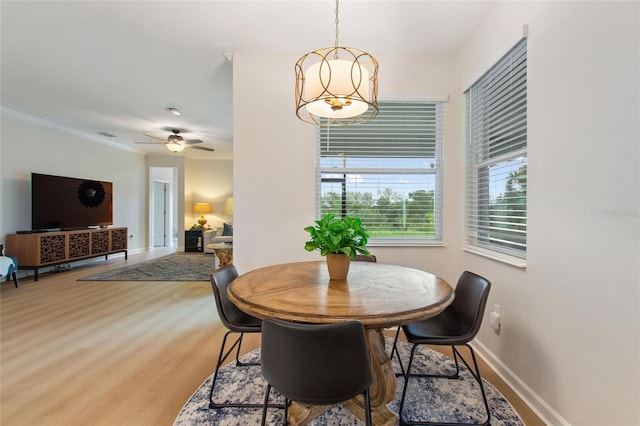 dining room featuring hardwood / wood-style flooring and ceiling fan