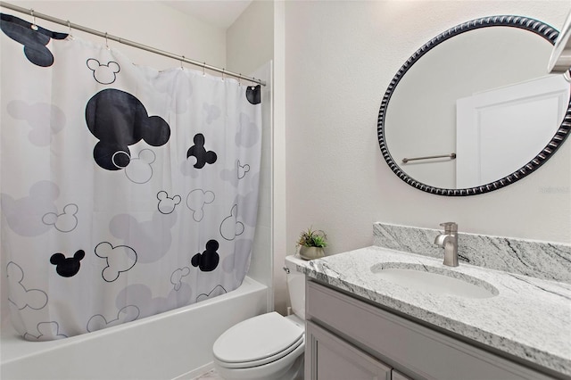 full bathroom with vanity, toilet, and shower / bath combination with curtain