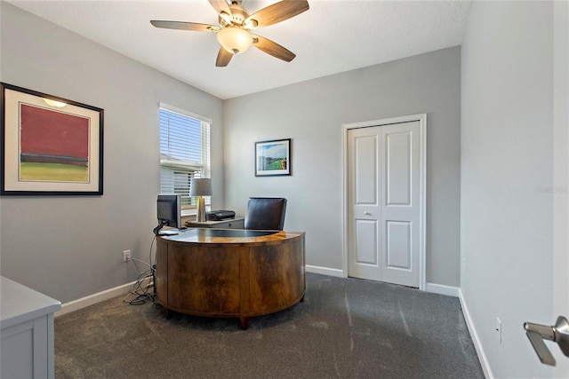 carpeted home office with ceiling fan