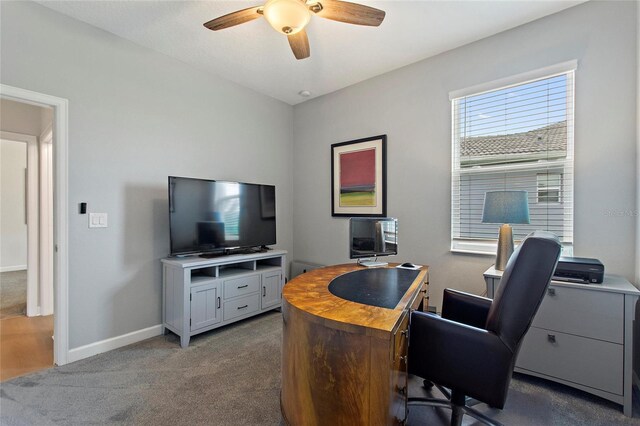 office with ceiling fan and carpet floors