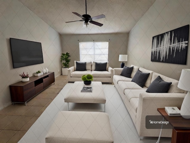 living room with ceiling fan and light tile patterned floors