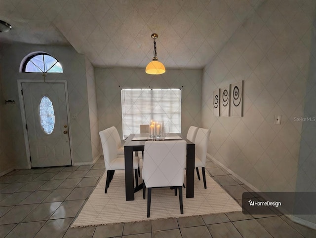 dining space featuring tile patterned flooring