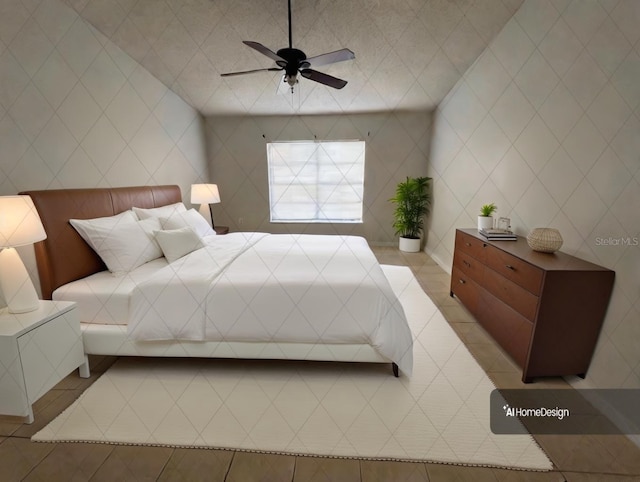 tiled bedroom featuring ceiling fan and tile walls