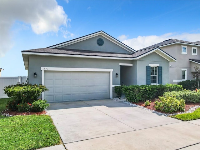 ranch-style house with a garage