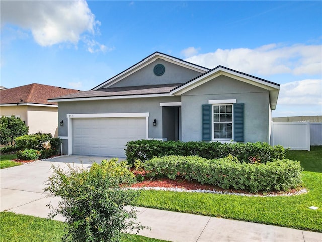 single story home featuring a garage