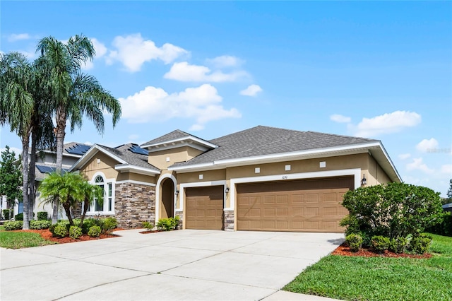 view of front of property featuring a garage