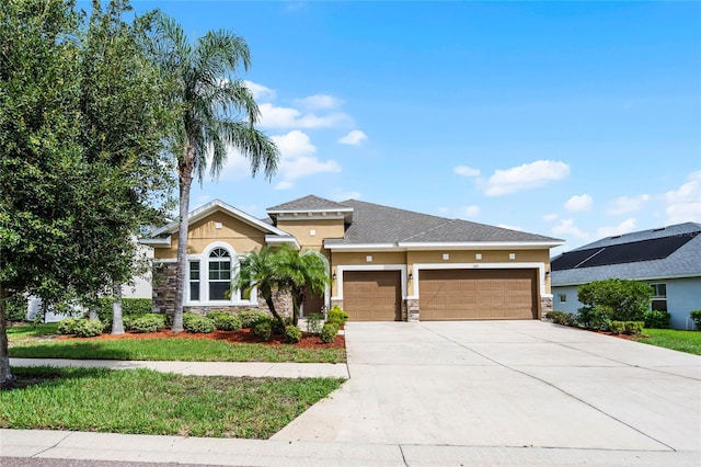 view of front of home with a garage