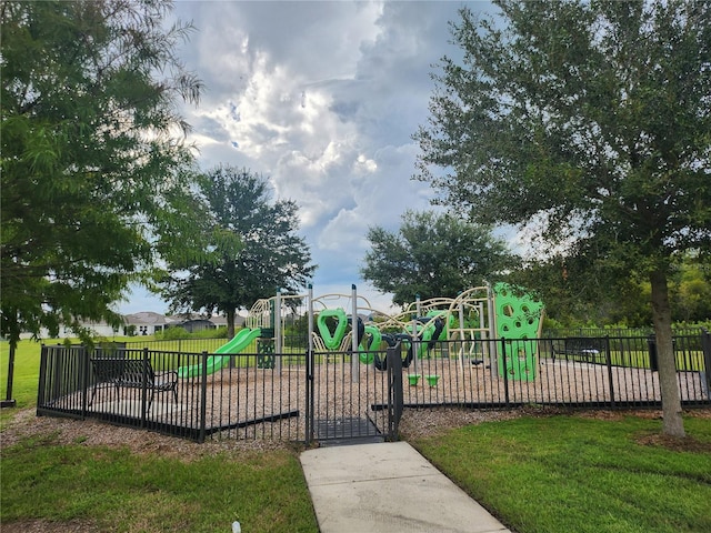 view of play area featuring a lawn