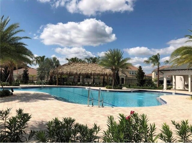 view of pool featuring a patio