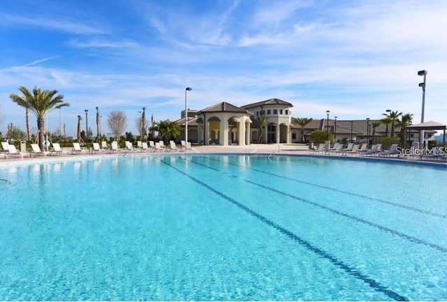 community pool with a patio