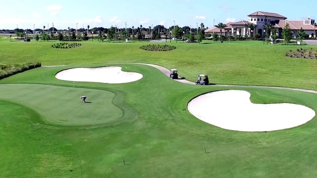 view of property's community featuring golf course view