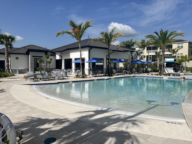 pool with a patio