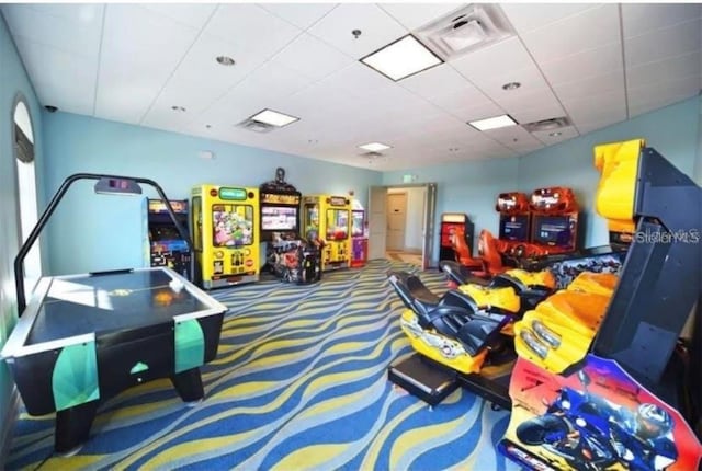 1077 Quaker Ridge Ln, Davenport, FL 33896 - playroom featuring visible vents and a paneled ceiling